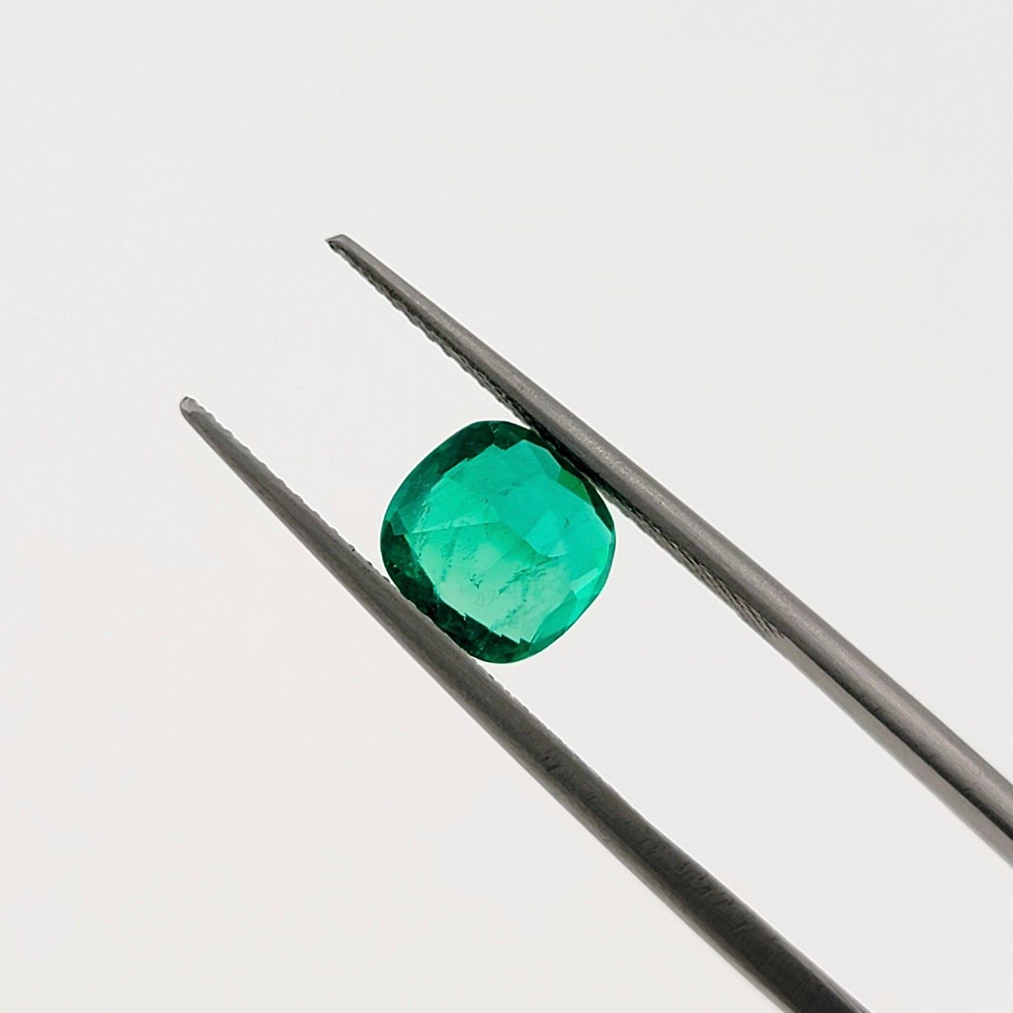 1.52 Ct. Cushion - Colombian Emerald - Emeralds Expert