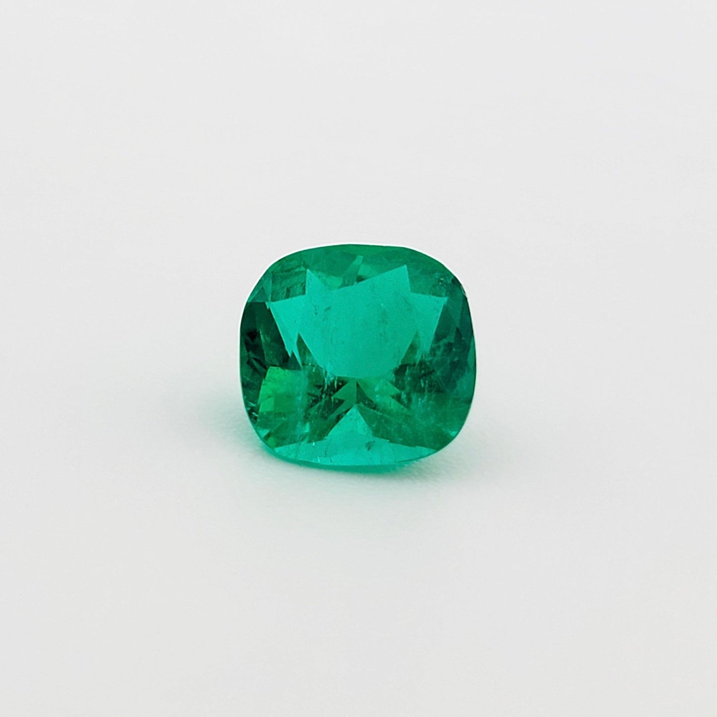1.52 Ct. Cushion - Colombian Emerald - Emeralds Expert