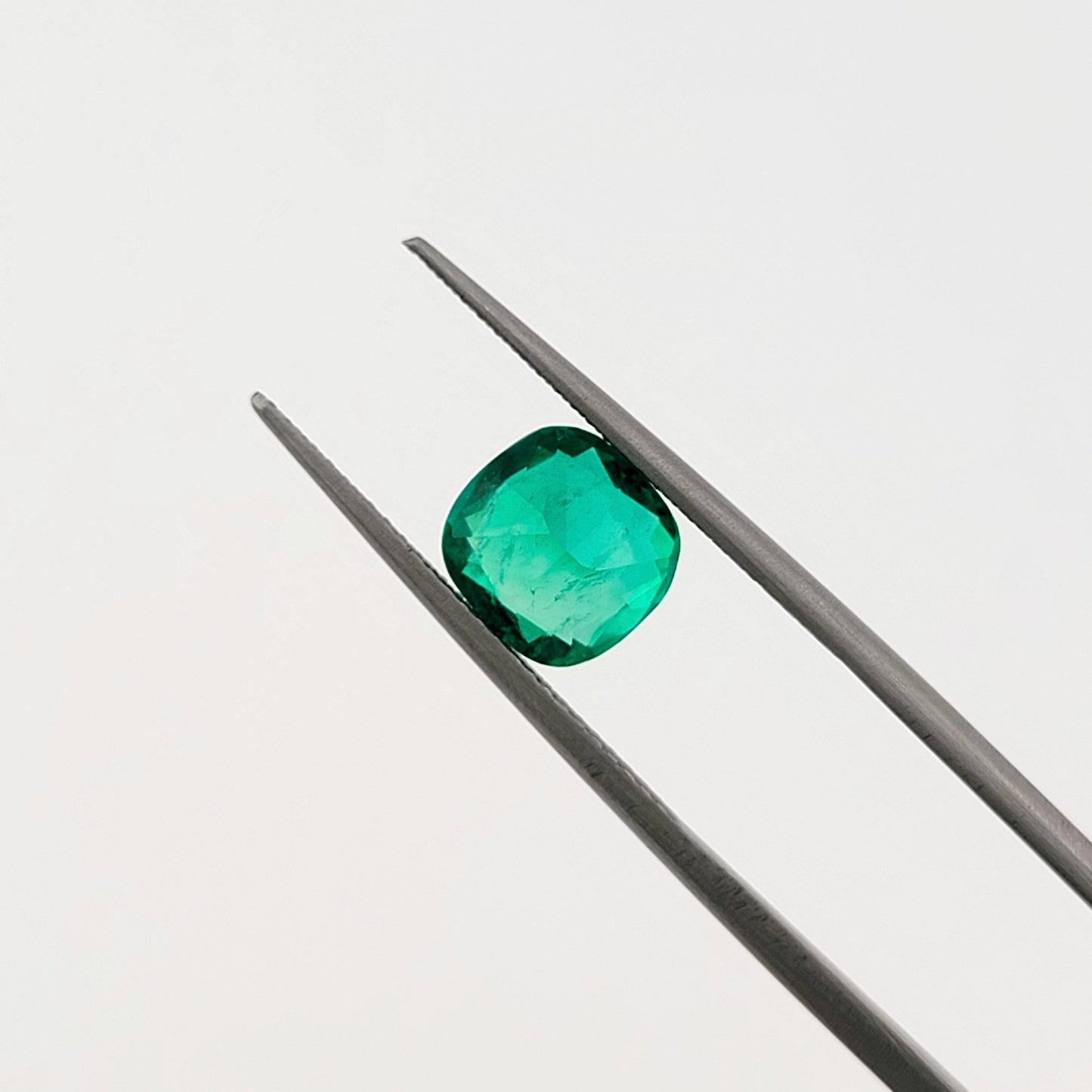1.52 Ct. Cushion - Colombian Emerald - Emeralds Expert